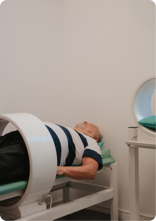 man lying on physio bed