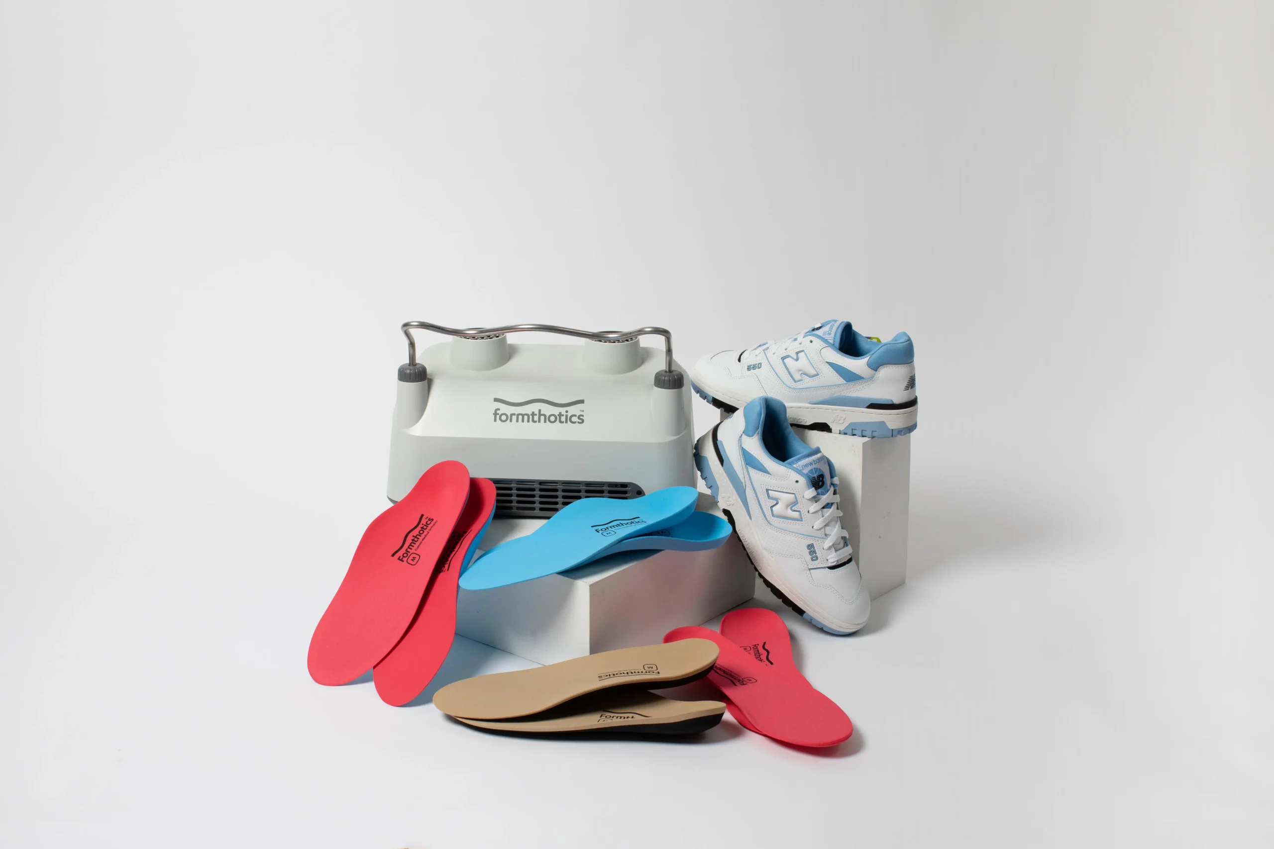 stack of shoes and insoles