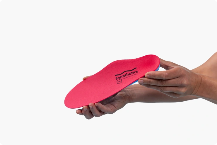 hand holding insole