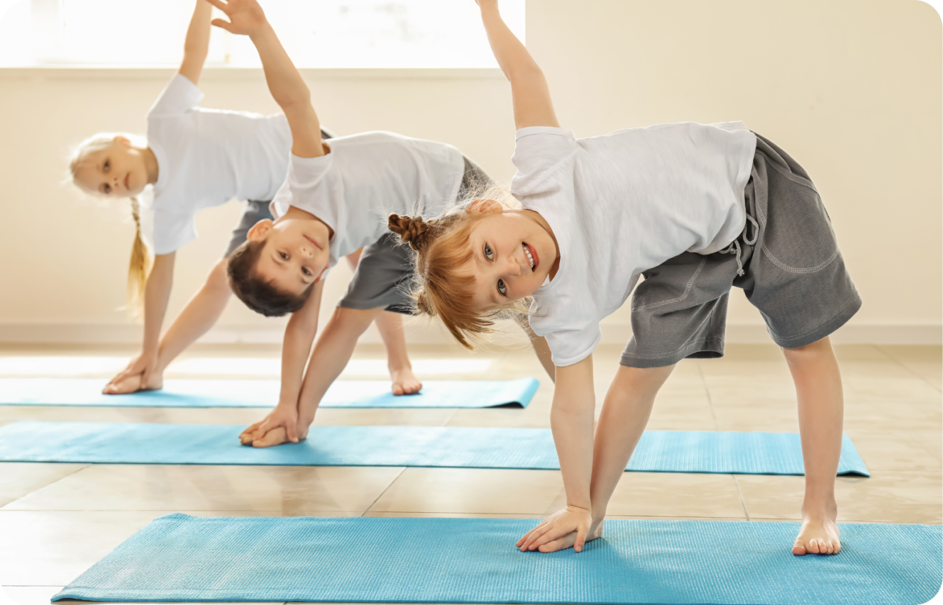 kids stretching on the yoga mat